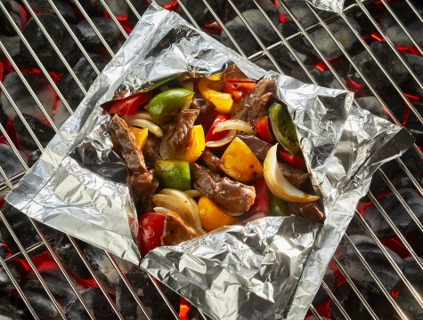 Steak Fajitas in a foil packet on the grill 