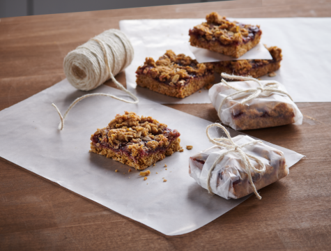 Oat bars wrapped in wax paper and tied with twine