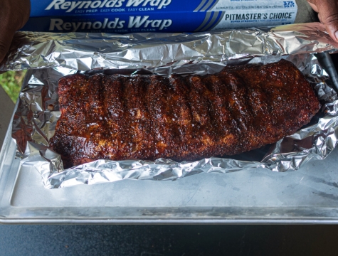 rack of ribs on a sheet of aluminum foil