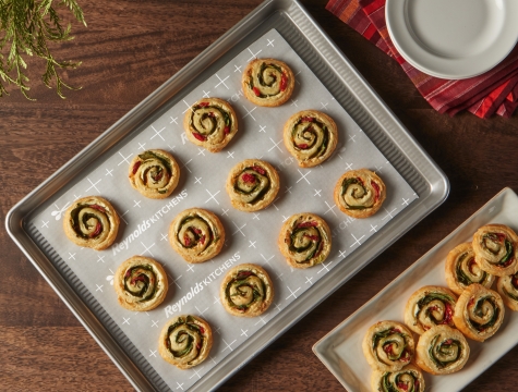 pinwheels on a parchment lined baking sheet
