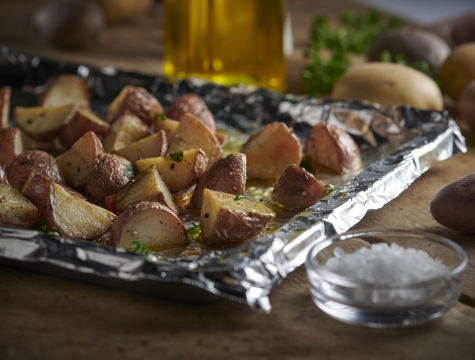 roasted potatoes on a foil lined baking sheet