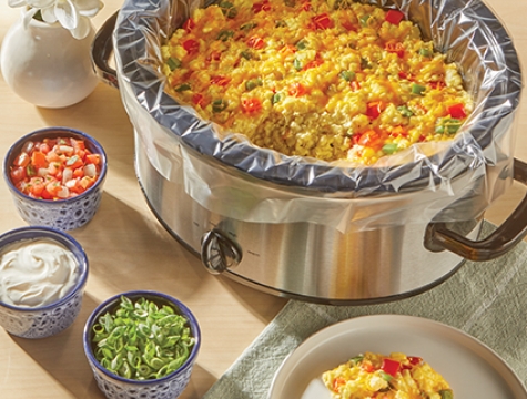 egg casserole in a slow cooker lined with a Reynolds Kitchens slow cooker liner