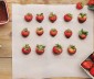 Some strawberries in a wax paper