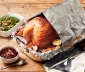 
Tent a Roasted Turkey with Foil
