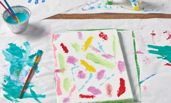 countertop prep paper lining a table and topped with arts and craft supplies