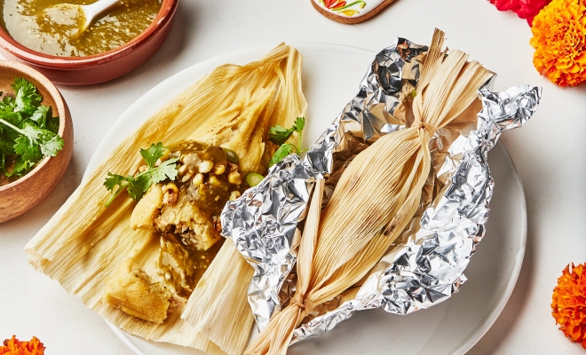 Wrapping Mexican tamales in corn husks