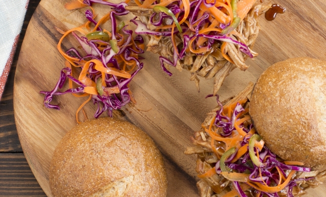 
Slow Cooker BBQ Pulled Pork Sandwiches with Honey Jalepeno Slaw
