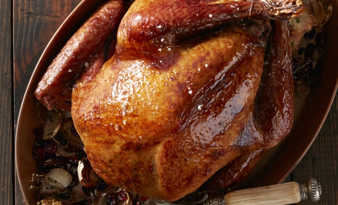 
Roast Turkey with Cranberry and Pomegranate Glaze
