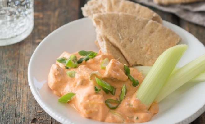 
Slow Cooker Buffalo Chicken Dip with Celery and Pita

