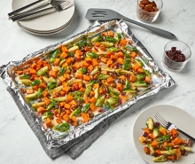 Roasted Sweet Potatoes and Brussels Sprouts with Cranberries and Pecans